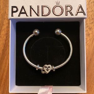 Pandora bracelet with double heart charm